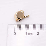 18K yellow gold pendant setting for Mexican Fire Opal necklace next to ruler for size comparison