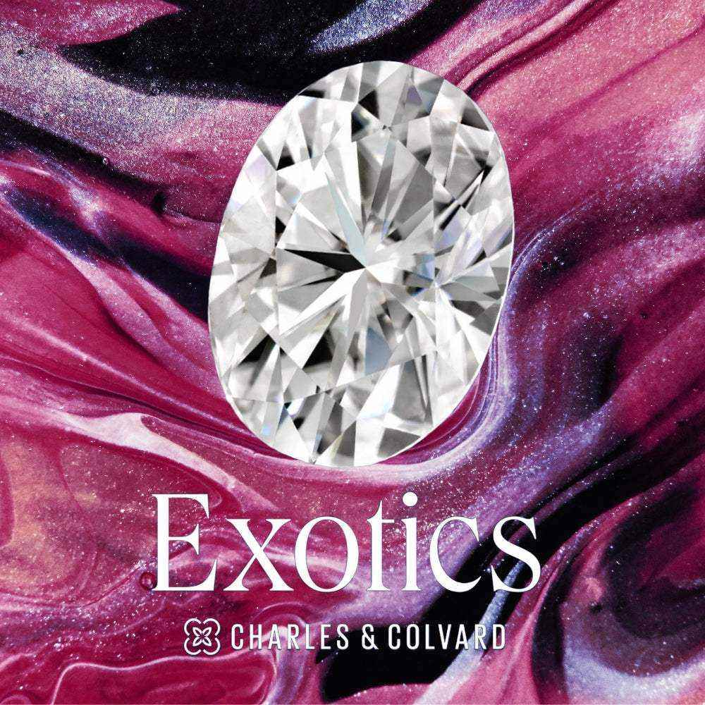 Charles & Colvard Forever One™ Certified Exotics Oval Brilliant Cut Moissanite gemstone on a vibrant purple and pink background.