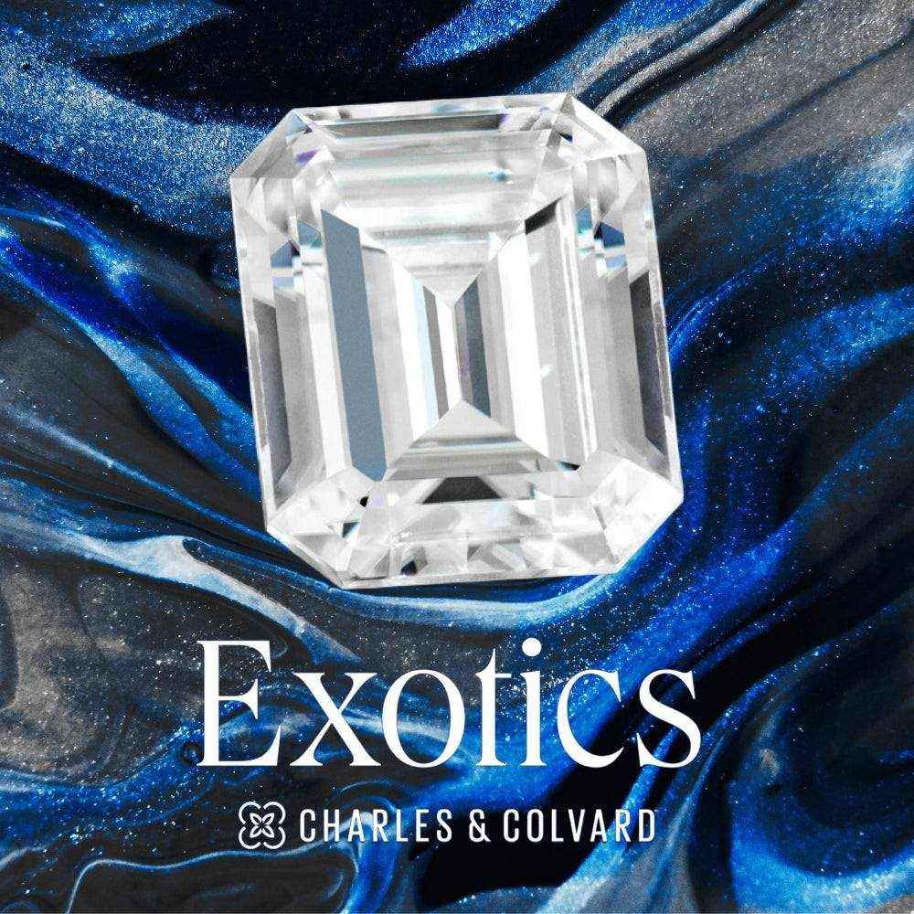 Charles & Colvard Forever One certified exotic emerald step cut moissanite gemstone on a blue and black marbled background
