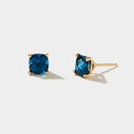 Tide Earrings London Blue Topaz cushion cut stud earrings in 14k yellow gold settings