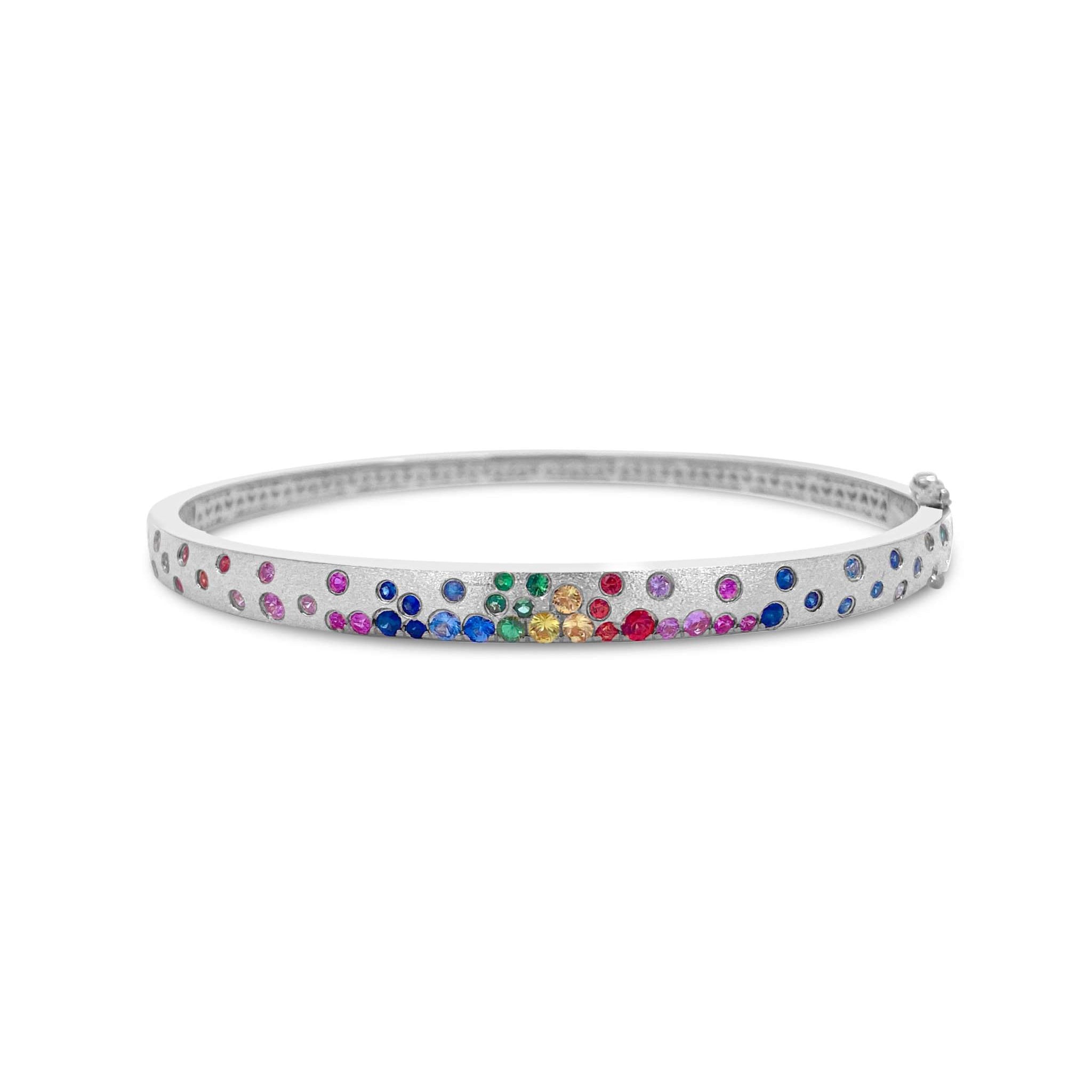 Sapphire Scattered Rainbow slim 14K gold bangle with rainbow sapphires and satin finish
