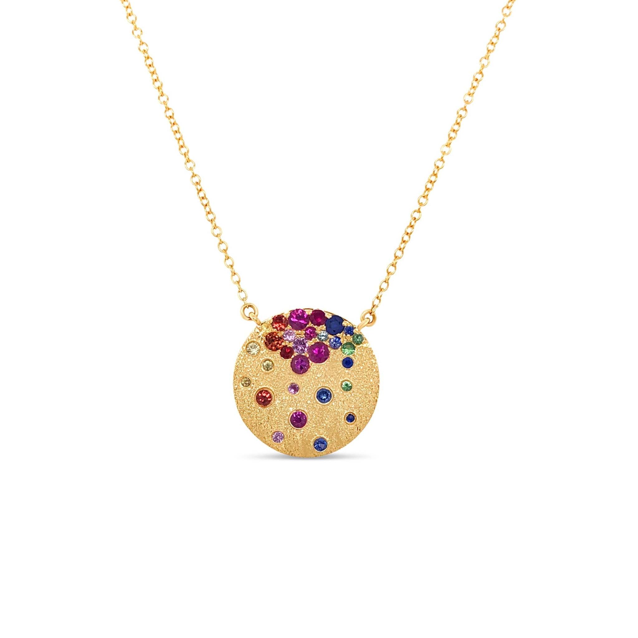 Sapphire Scattered Rainbow Disc Necklace in 14K yellow gold with rainbow sapphire gemstones and satin brushed finish