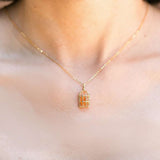 Bird Cage Mexican Fire Opal Necklace Pendant in 14K yellow gold worn on neck