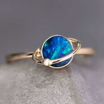 18K yellow gold Earth and Moon Doublet Opal ring with blue-green opal and small diamond for engagement or anniversary