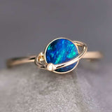18K yellow gold Earth and Moon Doublet Opal ring with blue-green opal and small diamond for engagement or anniversary