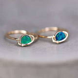 18K yellow gold rings with Earth and Moon Doublet Opal and small diamond detail