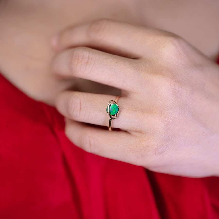 18K yellow gold Earth and Moon Doublet Opal ring with diamond on finger