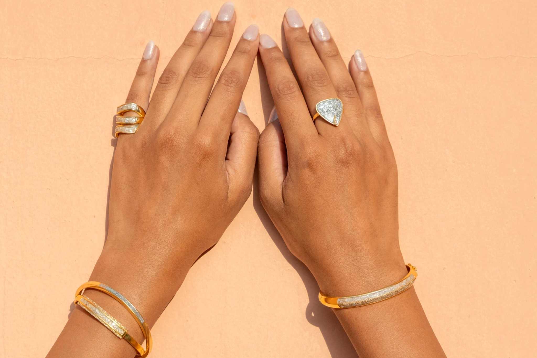 Geluk Gold Vermeil Bangle bracelet on wrist showcasing intricate craftsmanship and elegant design