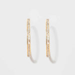 Pair of Hapur Gold Vermeil Hoop Earrings with sliced raw uncut diamonds and 18K gold layer on sterling silver base.