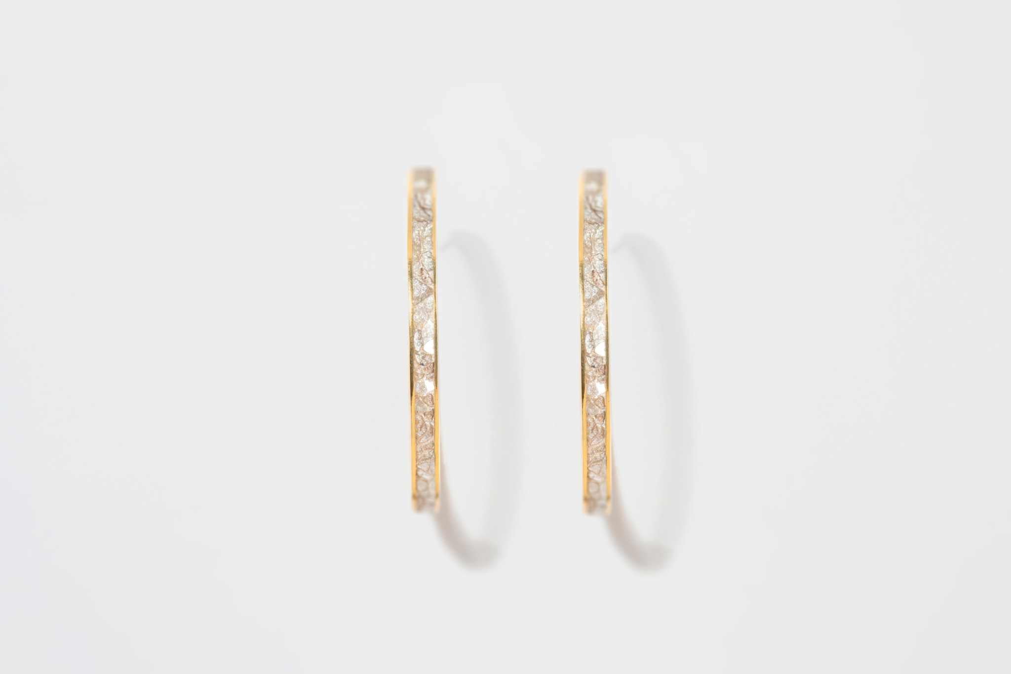 Pair of Hapur Gold Vermeil Hoop Earrings with sliced raw uncut diamonds and 18K gold layer on sterling silver base.