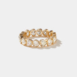 14k gold bezel set eternity ring with heart-shaped lab-grown diamonds totaling 2.4 carats