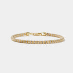 Tidal Tennis 14K gold bracelet with Italian design and diamond-cut sparkle, polished finish without diamonds.