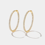 Lighthouse Hoops front-to-back diamond hoop earrings in 14k yellow gold with over 3 carats of lab-grown diamonds.
