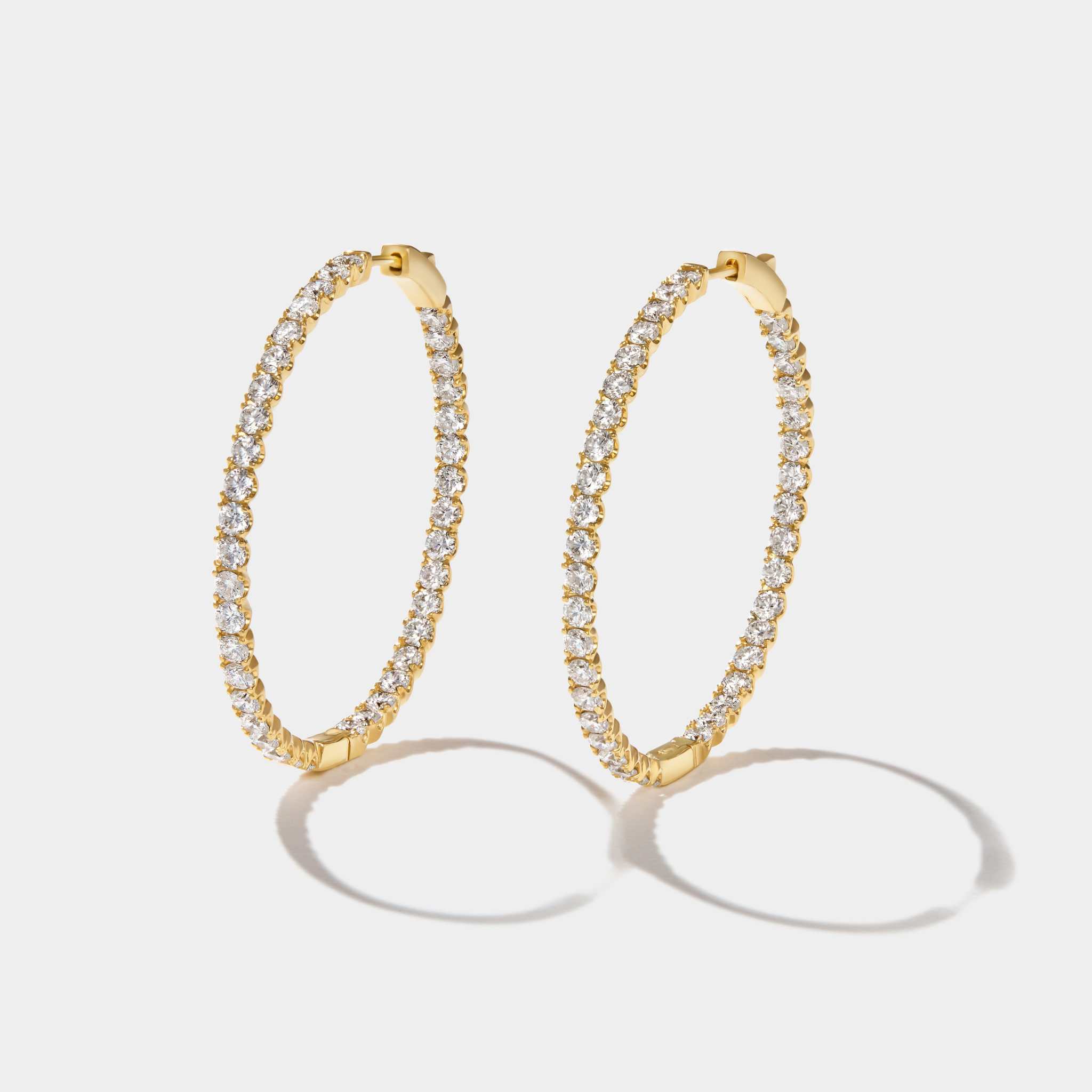 Lighthouse Hoops front-to-back diamond hoop earrings in 14k yellow gold with over 3 carats of lab-grown diamonds.