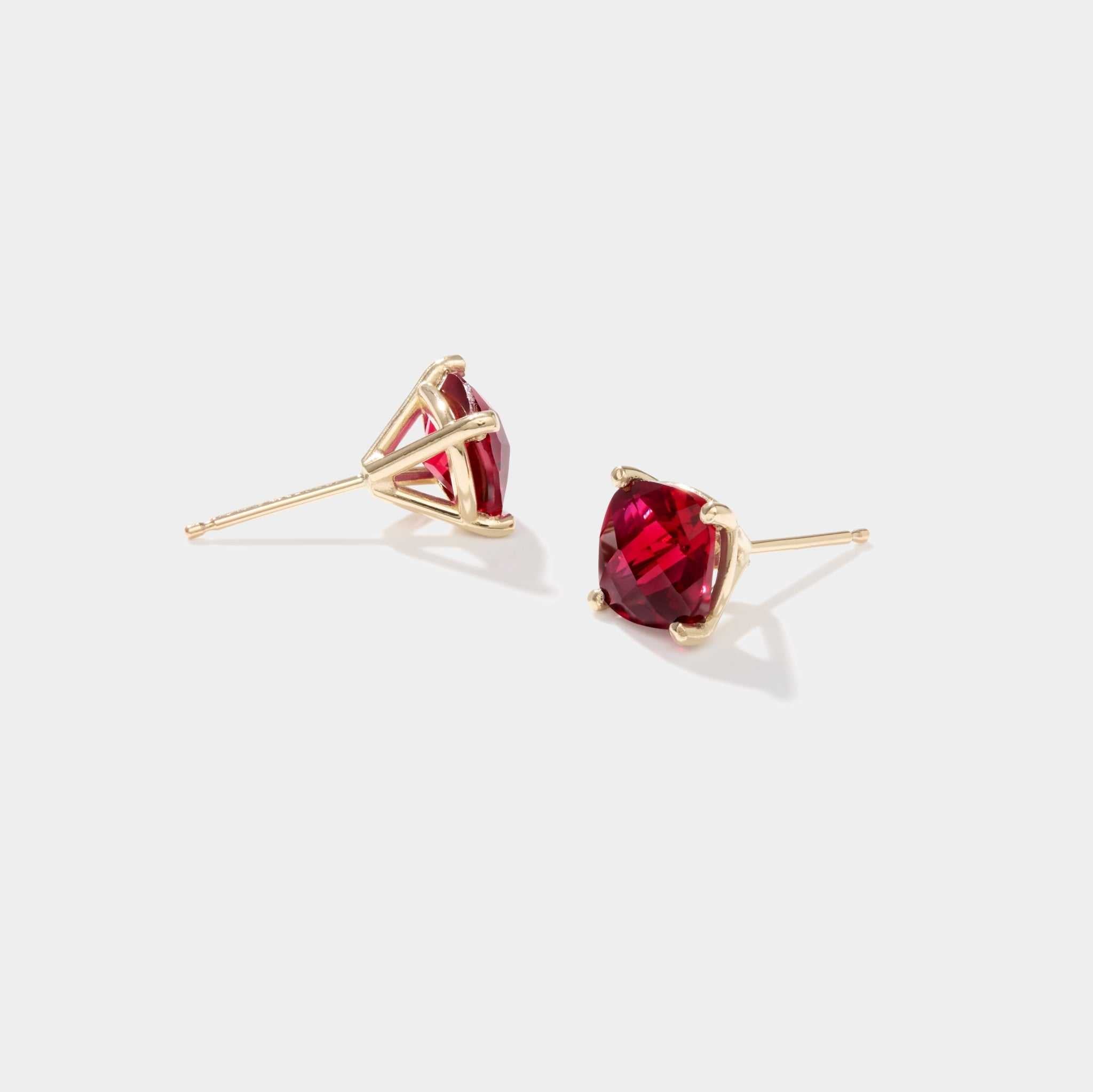 Boston Red Tide ruby cushion cut stud earrings in 14k yellow gold mounts
