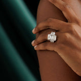 14K white gold three-stone engagement ring with radiant-cut lab-grown diamond and trapezoid side stones