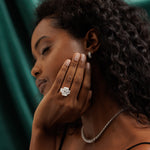 14K white gold three-stone engagement ring with 10.05-carat radiant-cut lab-grown diamond and trapezoid side stones