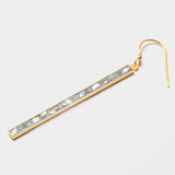 Miladi large gold vermeil earring with raw uncut diamonds and silver resin in a long geometric design