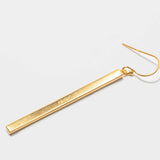Miladi large gold vermeil earring with long, rectangular geometric design and raw diamond accents