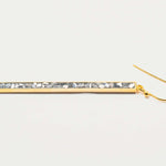 Miladi large gold vermeil earring with a long geometric design and raw uncut diamonds in silver resin.