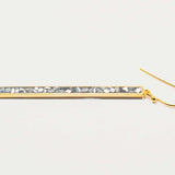 Miladi large gold vermeil earring with a long geometric design and raw uncut diamonds in silver resin.