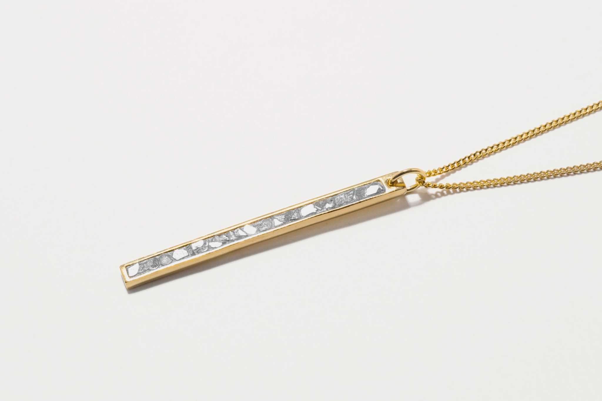 Miladi Gold Vermeil Necklace with rectangular pendant featuring sliced raw uncut diamonds and pave champagne diamonds in 18K gold vermeil.