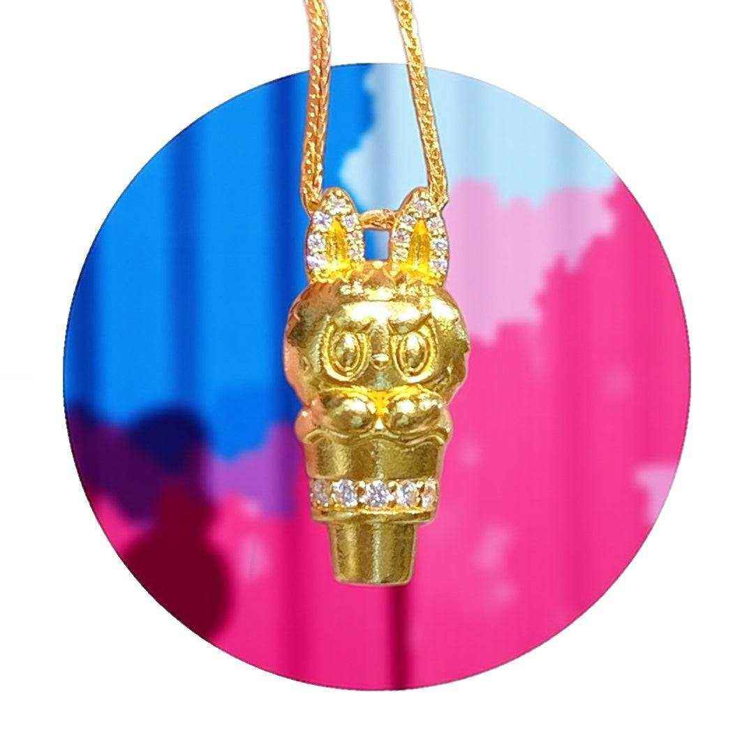 24K gold Labubu-inspired pendant with devilish bunny ears and sparkling moissanite stones on a gold chain