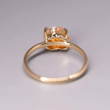 Diamond Ribbon Wrapped Fire Opal Ring in 18K Yellow Gold