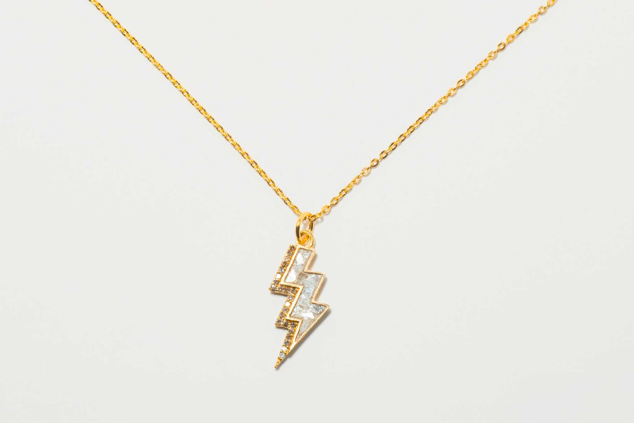 Rishi Bolt Diamond gold vermeil lightning bolt pendant necklace with pavé and raw diamonds on 18K gold chain