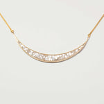 Thane Gold Vermeil Pendant necklace with sliced raw uncut diamonds and 18k gold vermeil on a delicate chain