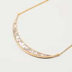Thane Gold Vermeil Pendant necklace with sliced raw uncut diamonds and 18k gold vermeil crescent design on delicate chain