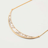 Thane Gold Vermeil Pendant necklace with sliced raw uncut diamonds and 18k gold vermeil crescent design on delicate chain