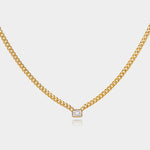 Emerald cut diamond bezel-set on yellow gold Cuban chain necklace