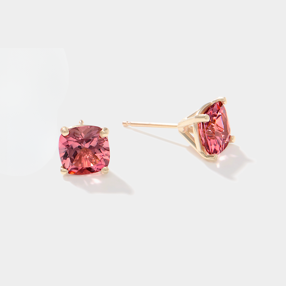 Nantucket Red pink tourmaline cushion cut stud earrings set in 14k yellow gold four-prong mounts